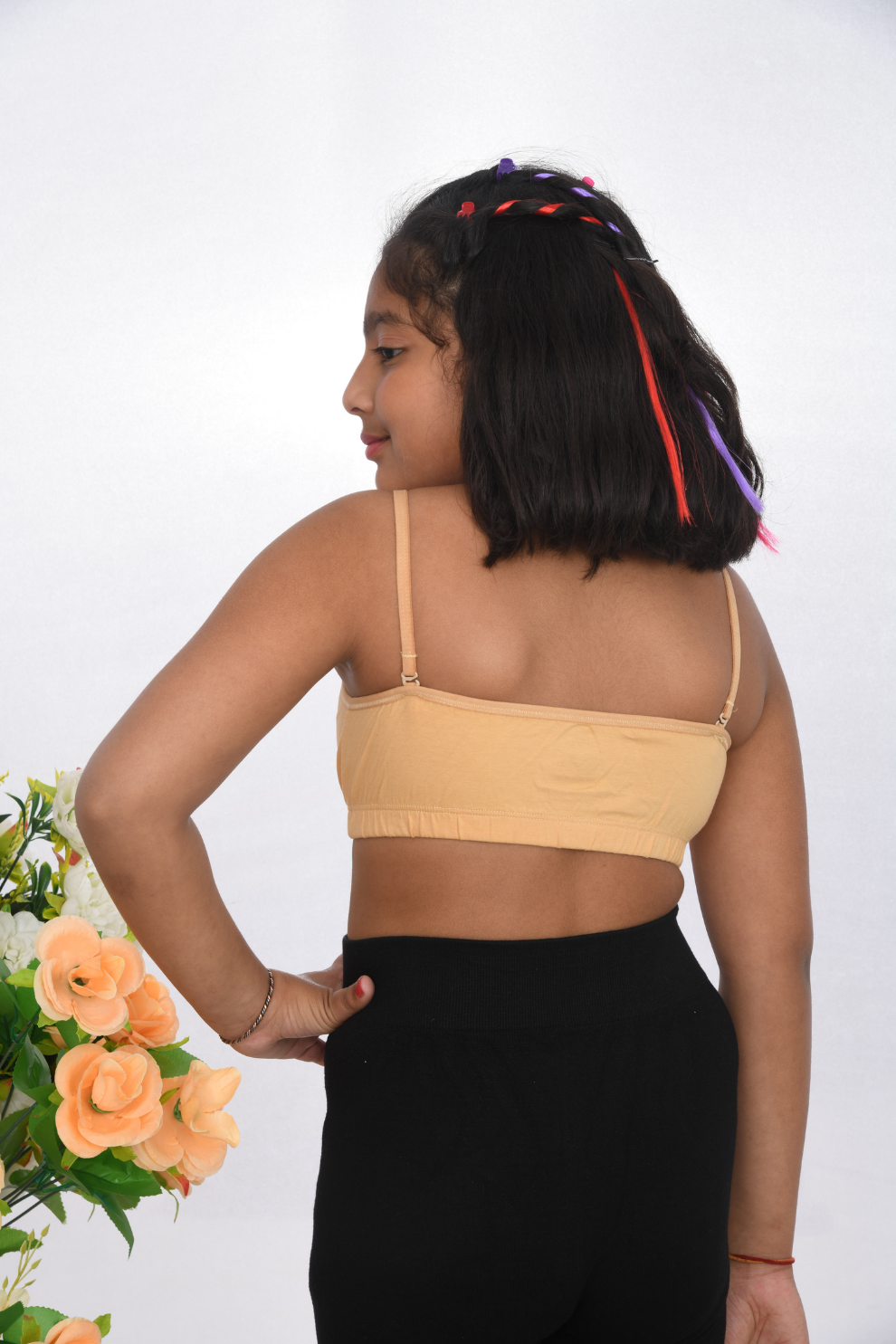Kids first bra, beige training bra with lace design, adjustable straps, and a tag-free finish back view